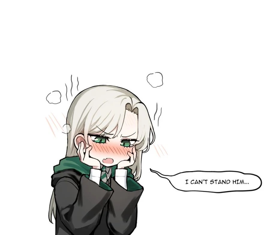 A small flustered Female Draco holding her cheeks
